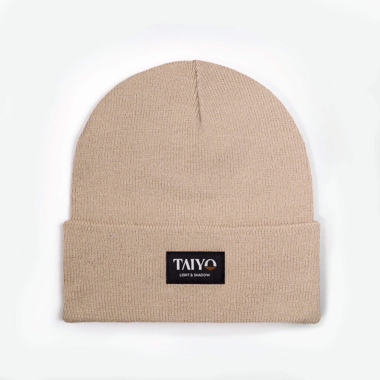 bonnet revers beige avec patch taiyo noir en polyester recyclé