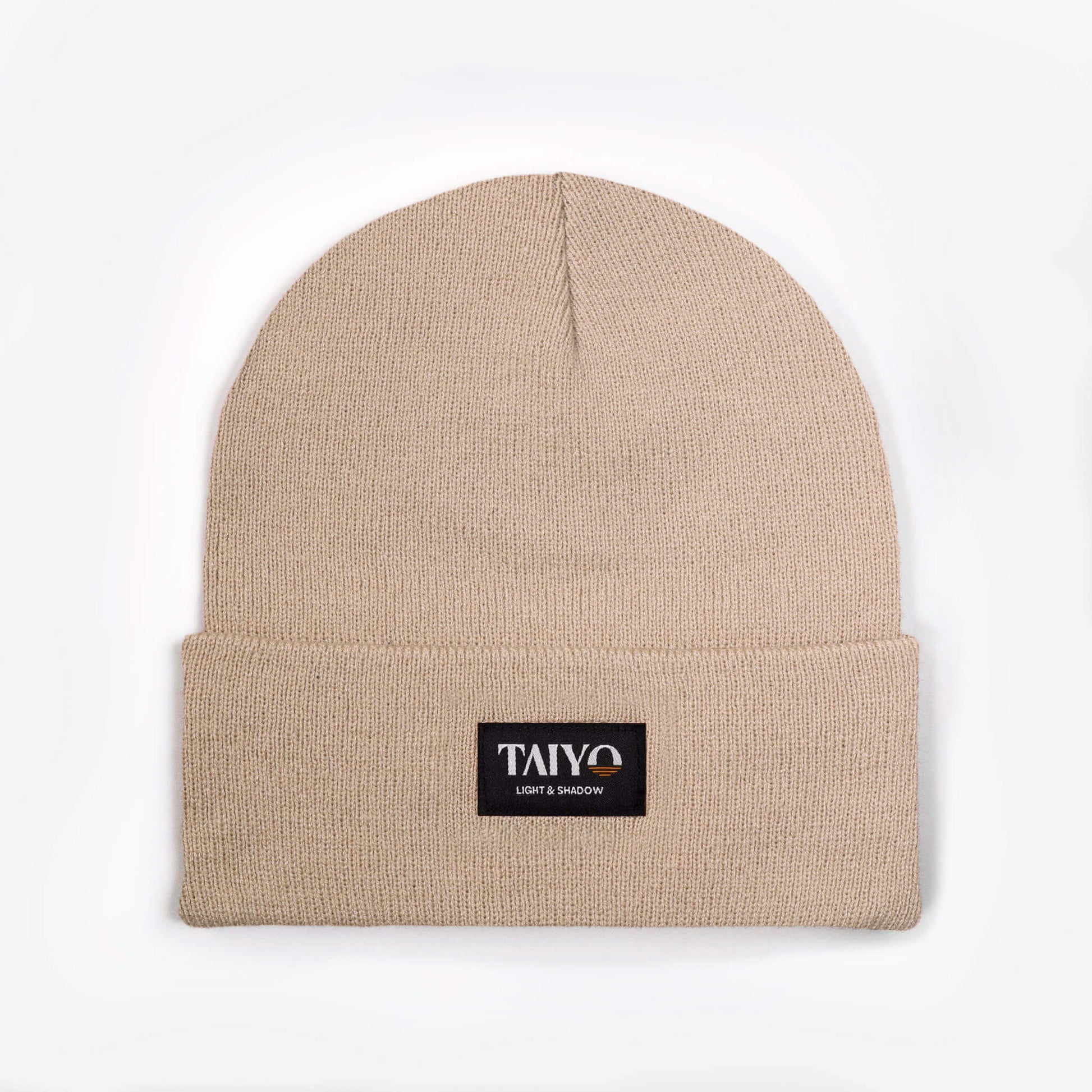 bonnet revers beige avec patch taiyo noir en polyester recyclé