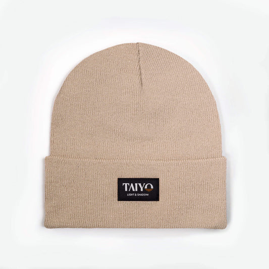 bonnet revers beige avec patch taiyo noir en polyester recyclé