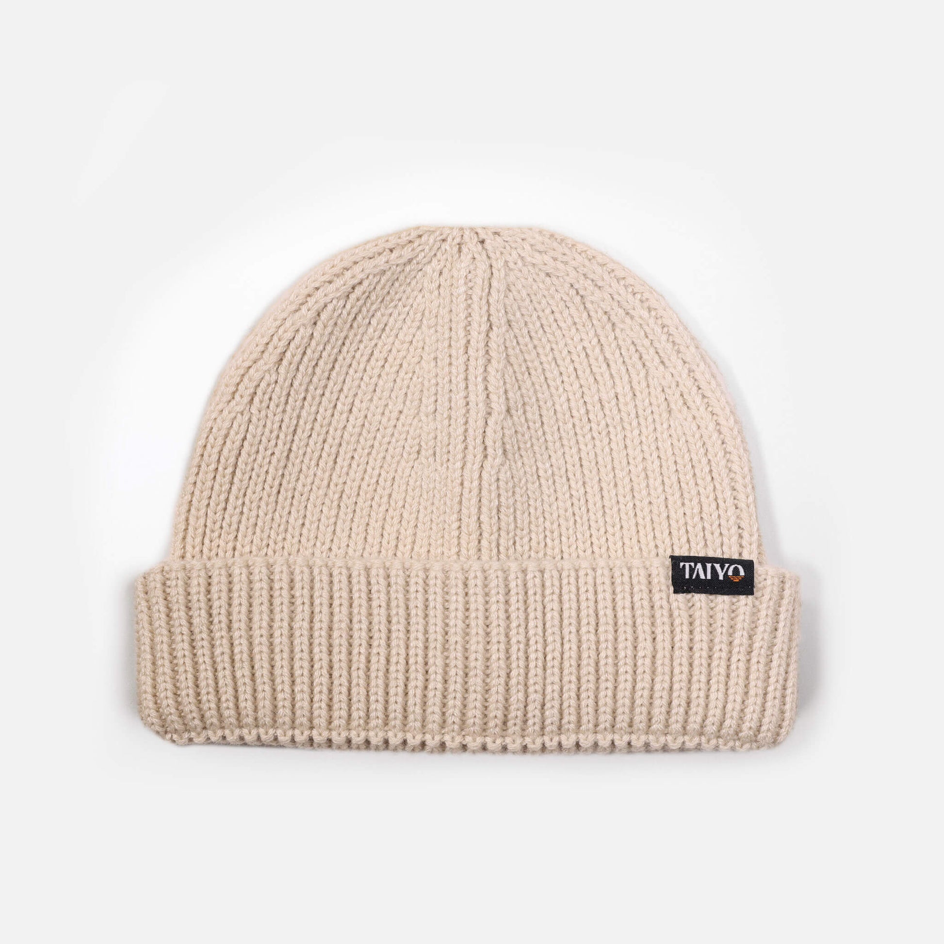 Bonnet docker homme beige couvrant la pointe des oreilles