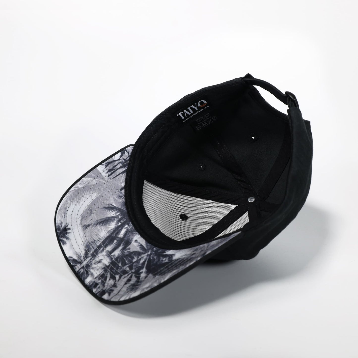 casquette palmiers noir et blanc