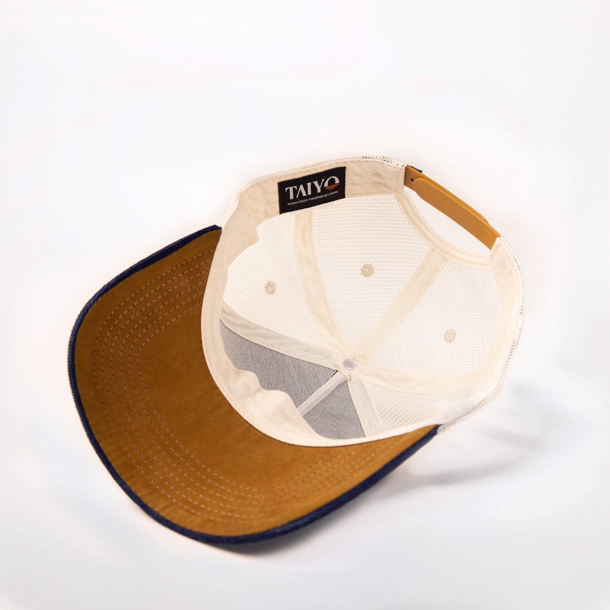 casquette trucker en velours bleu et suede marron